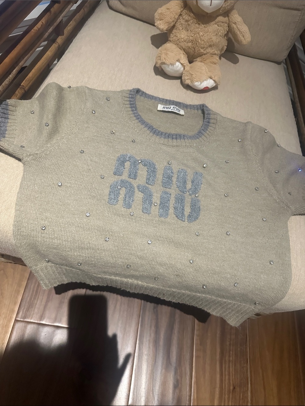 Beige slightly cropped Sweater with Light Blue Trim. Varsity style.
